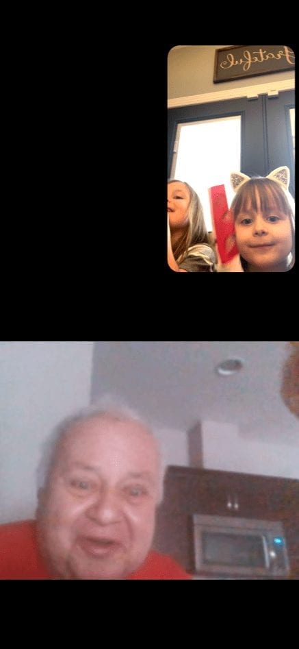 Grandfather's first-ever video chat with his granddaughters